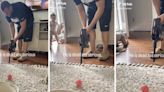 Dad meticulously vacuums every single tassel on the living room carpet in hilarious TikTok