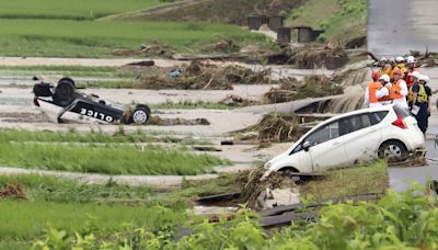 Hundreds flee as heavy rain in northern Japan triggers floods and landslides