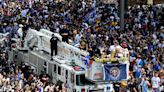 Officer hit by fire truck at Denver Nuggets championship parade