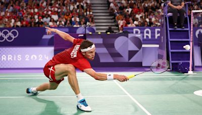 Denmark's Axelsen defends badminton gold title