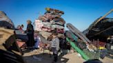 The Latest | First shipment of humanitarian aid leaves for US-built floating pier off Gaza