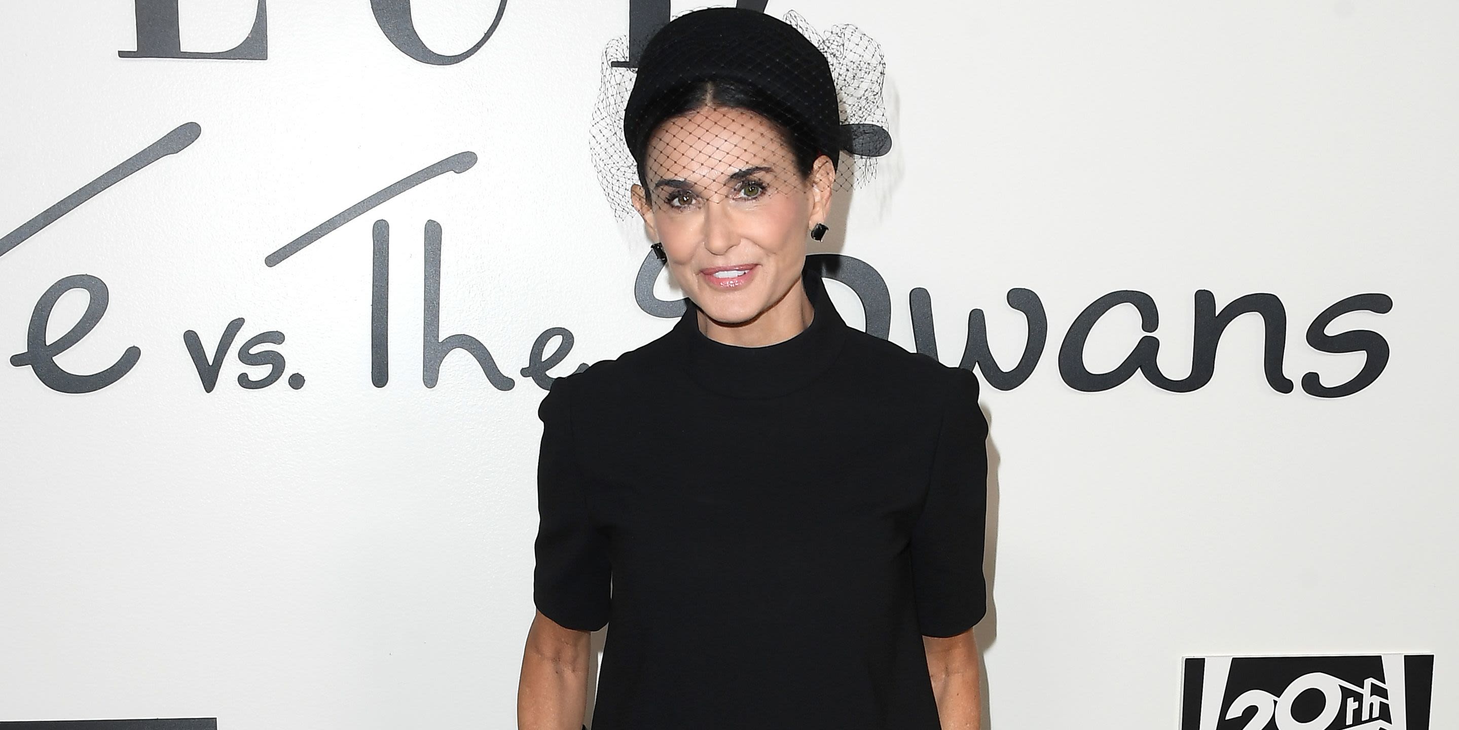 Demi Moore's veiled pillbox hat and all black 'fit is giving chic mob wife at a funeral