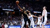 Mitchell scores 28 as Cavaliers hold off Magic 104-103