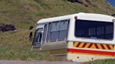 A woman was yelled at by her tour guide when she fell asleep on the bus, sparking discussion about respectful tourist behavior