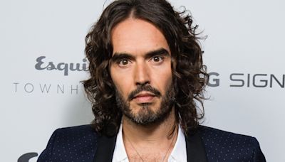 Russell Brand says he was baptised in the Thames and is now a Christian