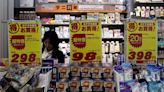 Japan's firm wholesale inflation keeps alive near-term rate hike risks