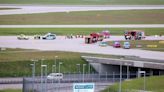 Climate activists glue themselves to Munich airport runway, pausing traffic