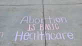 Chalk on a sidewalk at Idaho Capitol led to police assault, abortion rights group claims