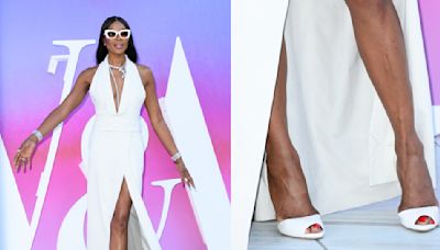 Naomi Campbell Goes White-Hot in Peep-Toe Stilettos and Slit Dress for V&A Summer Party Celebrating ‘Naomi: In...