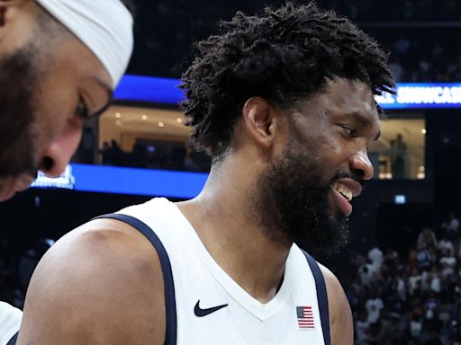 Joel Embiid seemed to be in good spirits on the bench despite his Olympic DNP against South Sudan