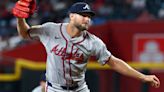 Sale survives 'grind,' gets MLB-leading 12th win