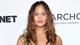 Chrissy Teigen Wows in Her Own Naked Floral Dress 1 Day After the Met Gala