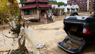 People moved to Asheville to escape extreme weather. They forgot its tragic history.