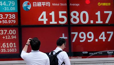 Stock market today: Global stocks mostly rise, with Japan's Nikkei 225 index logging record close
