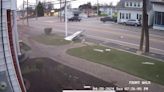 VIDEO: Truck crashes through ice cream shop's parking lot