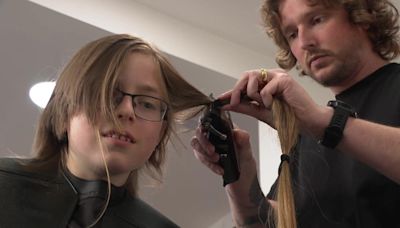 Boy, 11, has first haircut to help cancer patients