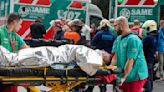 A train in central Buenos Aires strikes a boxcar on the track, injuring dozens