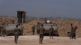Israel balks after Hamas says it agrees to cease-fire deal