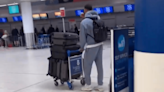 Rangers star Connor Goldson spotted leaving Scotland with four suitcases