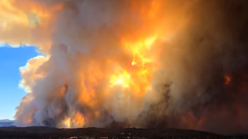 New Mexico village evacuates as 2 fires converge on it ‘like a pair of tongs,’ official says | CNN