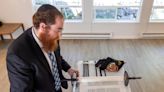 Painstakingly crafted, Torah scroll arrives on Bainbridge Island to celebration