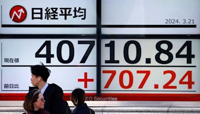 Asia shares set for weekly gain on rate-cut rally