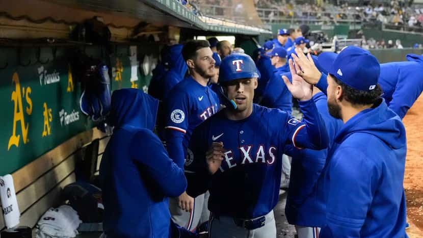 Evan Carter scratched from Texas Rangers’ lineup due to lower back stiffness