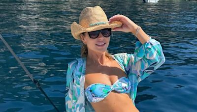 Amanda Holden shows off her incredible figure in a strapless bikini