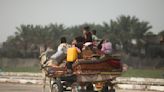 On foot and by donkey cart, thousands flee widening Israeli assault in central Gaza