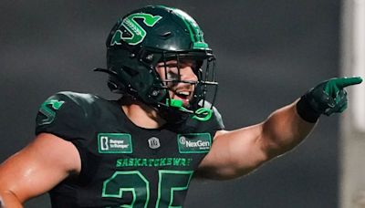 Roughriders' fullback Clint Ratkovich celebrates first CFL touchdown