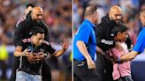 Lionel Messi's bodyguard springs into action to remove overzealous fans who tried to interact with soccer star