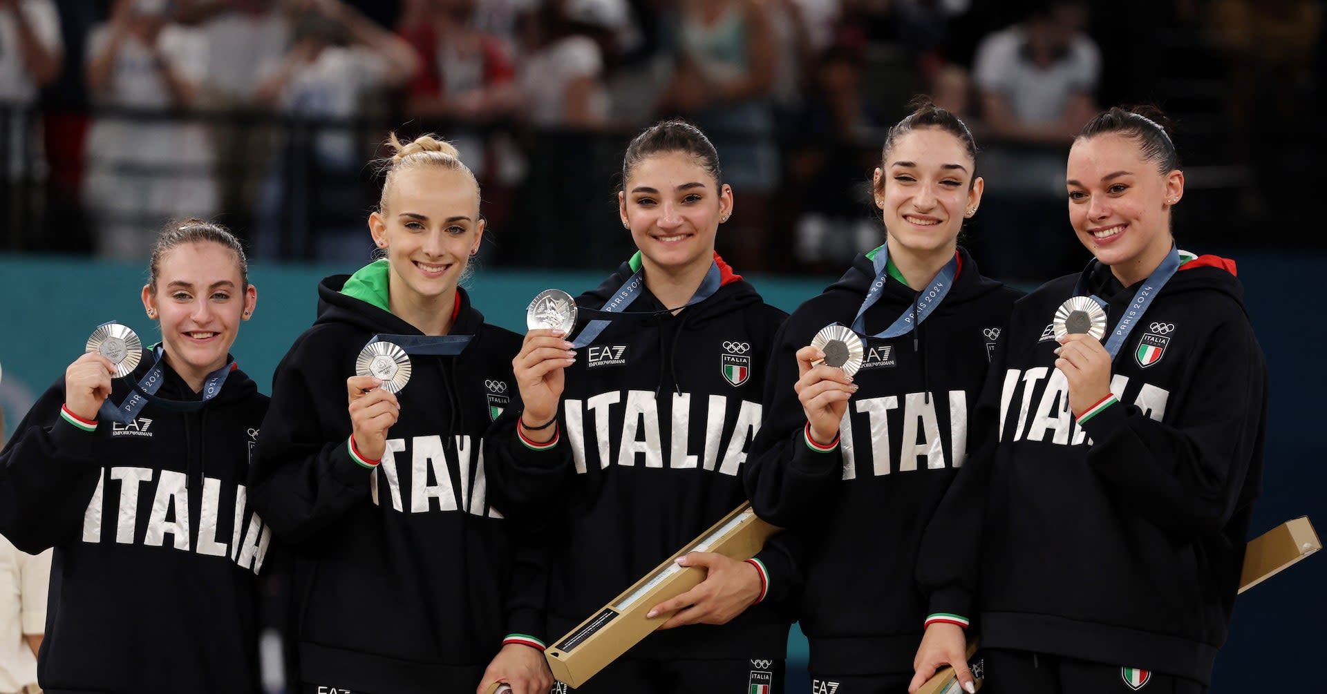 Gymnastics-Italy and Brazil celebrate breakthrough medal success in team final