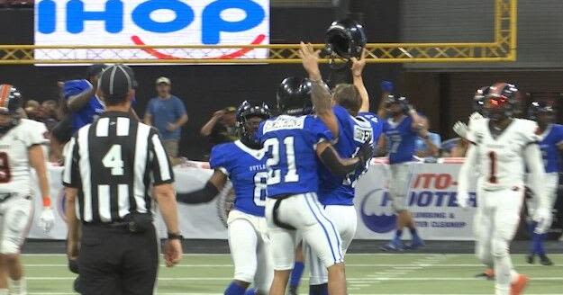 Outlaws win on full-field kick, take first place in AFL