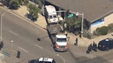 13 people hurt after van rams into side of Escondido building