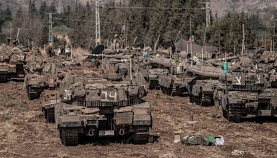 Tanks gather near Israeli-Lebanon border - as defence minister holds talks over 'expansion' of IDF activity