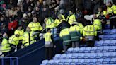 Bolton fan dies after suffering cardiac arrest during match against Cheltenham