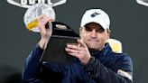 West Virginia coach Neal Brown agrees to modest pay cut in 1-year contract extension