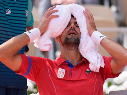 Djokovic wins his 1st Olympic gold medal by beating Alcaraz in men's tennis final