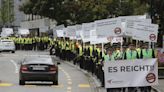 Swiss airline pilots march on HQ to press contract demands