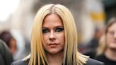 Avril Lavigne rocks long wavy hair with 'signature' fit: 'New era vibes'