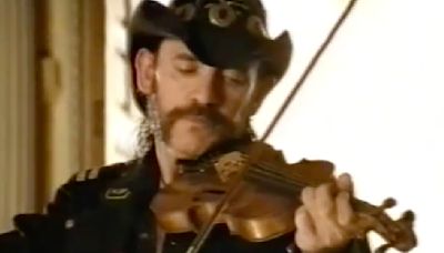 Watch Motörhead’s Lemmy play the violin in this bizarre Kit Kat advert from 2001