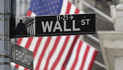 Stock market today: Wall Street holds steadier as oil prices pare their gains