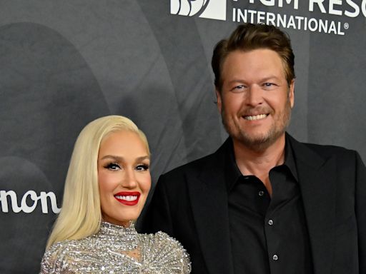 Gwen kisses Blake on stage at Vegas charity gala as she praises his ‘big heart’