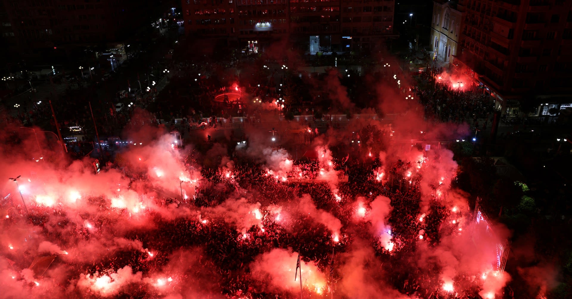 Passionate Olympiakos fans celebrate historic victory