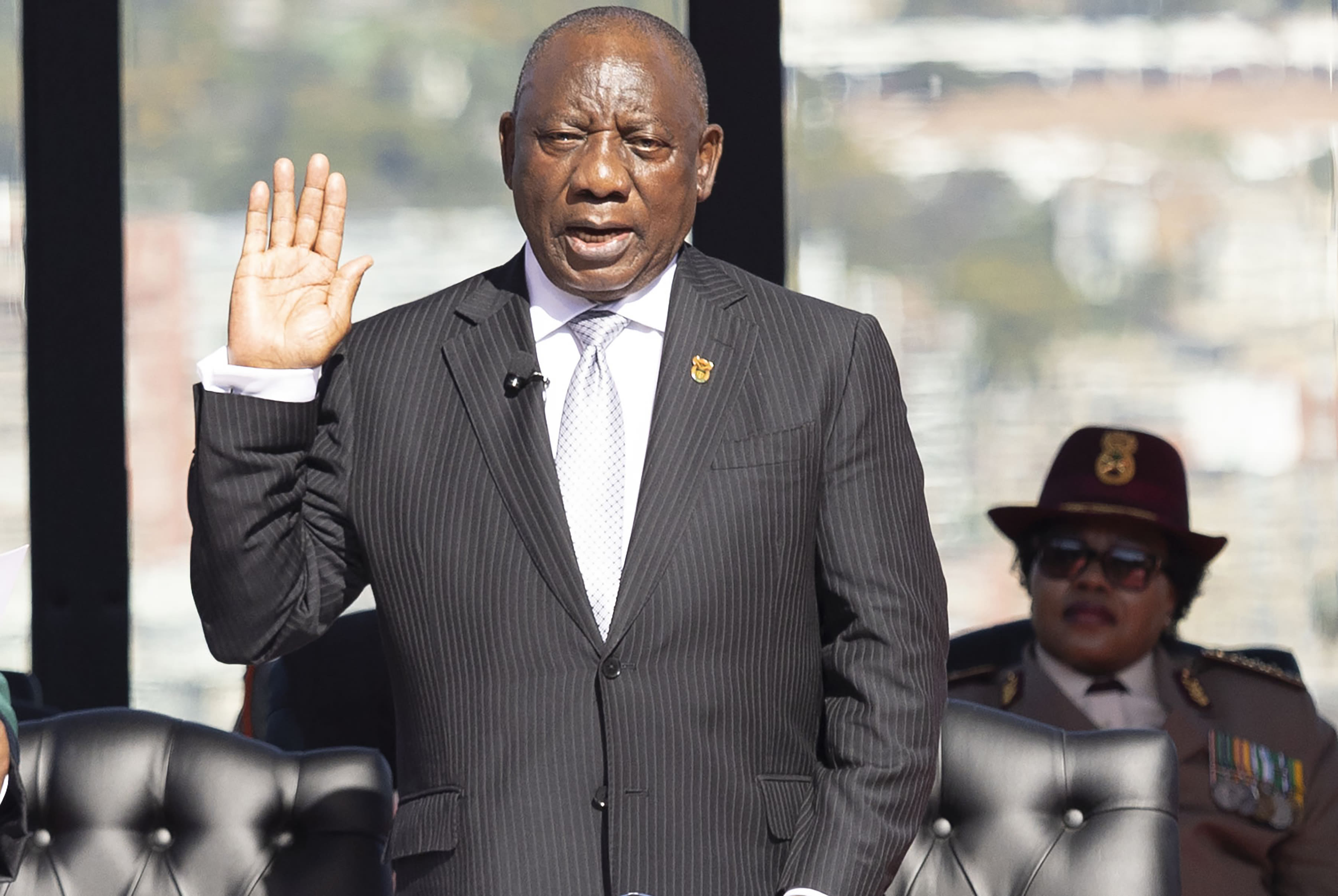 Ramaphosa is sworn in for a second term as South Africa's president with help from coalition parties