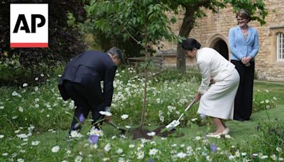 Japan Emperor Naruhito plants cherry tree at Oxford University in UK