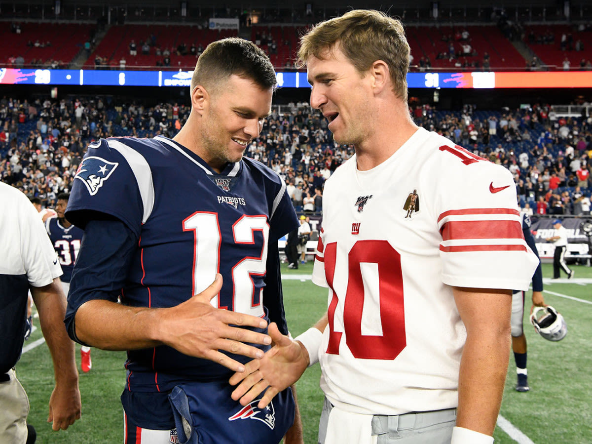Tom Brady Sends NSFW Message to Eli Manning at Jersey Signing