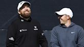 Open day three: Rory McIlroy supporting leader Shane Lowry after missing the cut