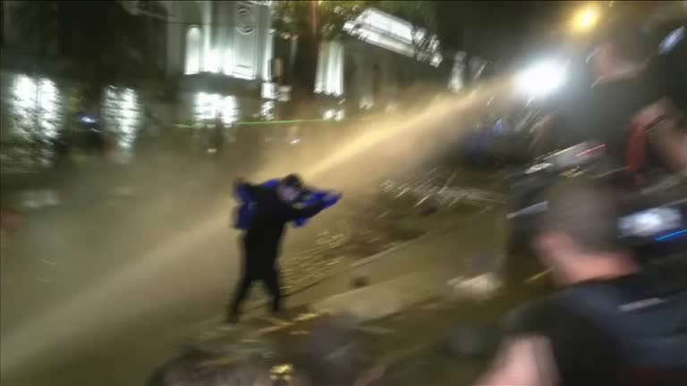 Georgia police unleash water cannons on protesters