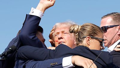 La Nación / Reportan las muertes de un partidario de Trump y del presunto atacante